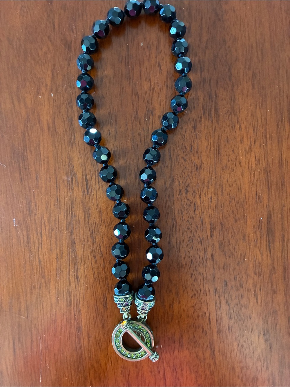 Heidi Daus Black Faceted Bead Necklace with Decorative Green-Accented Toggle